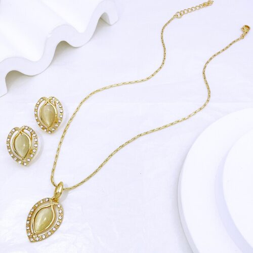 latest opal fashion jewelry for women in gold color, featuring a necklace and earrings set with water drop and heart pendant designs, perfect for brides, weddings, and party accessories.