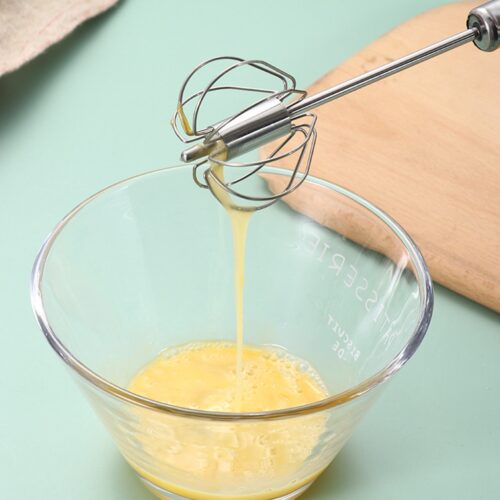 semi-automatic egg beater made of 304 stainless steel, a manual hand mixer, and a self-turning egg stirrer—an essential kitchen accessory and egg tool.