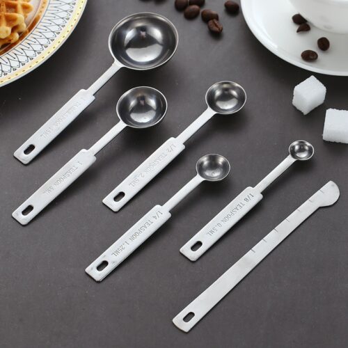 Image of a stainless-steel measuring cups and spoons set, a kitchen essential for precise ingredient measurements.