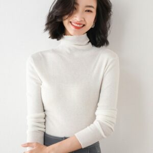 women's high neck knitwear pile collared sweaters, a cozy and stylish winter wardrobe choice.