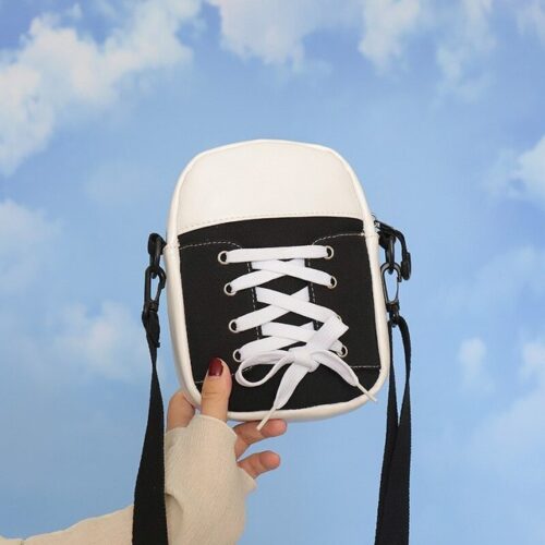 shoulder crossbody bag in the shape of shoes, a unique and fashionable accessory.