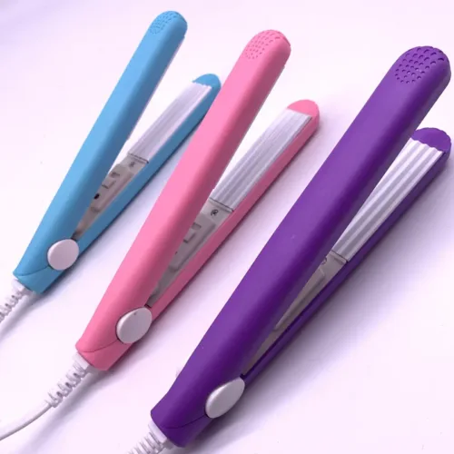 Mini electric hair iron, a compact and portable tool for on-the-go hair styling.