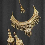 Artificial gold bridal jewellery design with this antique jewellery set is the perfect blend of traditional look