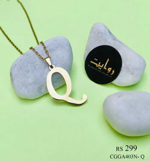 necklace adorned with a capital letter 'Q' pendant. The pendant, with its sleek and minimalist design, hangs elegantly from a delicate chain, creating a personalized accessory that exudes understated elegance