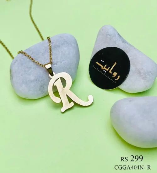 necklace with a capital letter 'R' pendant. The pendant, featuring intricate detailing and a polished finish, dangles gracefully from a slender chain, creating a subtle yet striking personalized accessory.