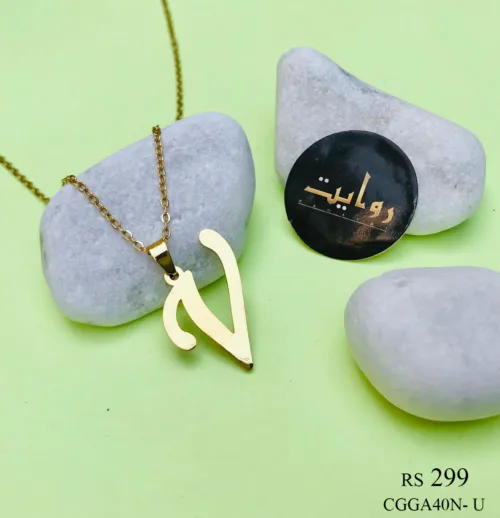 a capital letter 'V' pendant. The pendant, with its sleek and minimalist design, hangs elegantly from a delicate chain, creating a personalized accessory that exudes understated elegance.