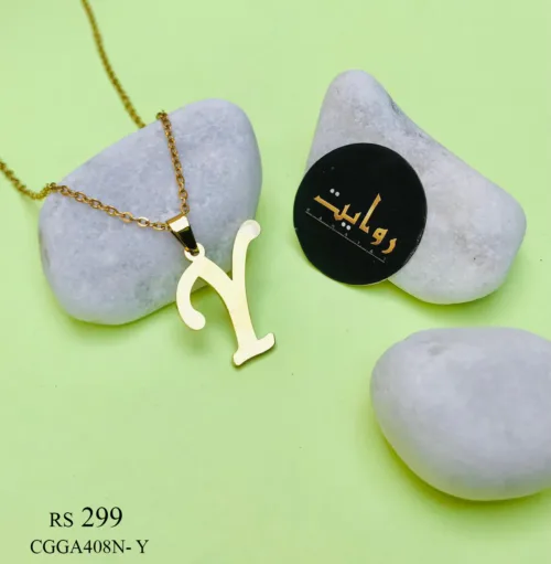 with a capital letter 'Y' pendant. The pendant, intricately designed with filigree details, hangs elegantly from a slender chain, adding a touch of sophistication and personalization to the accessory.