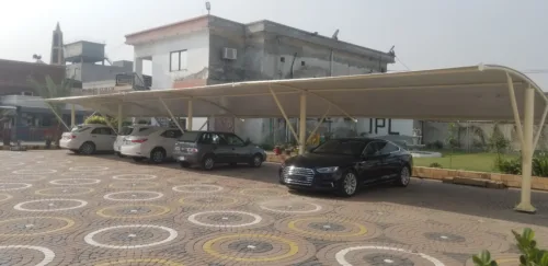 Tensile fabric Car Parking Shed in Pakistan to protect vehicles from sun and rain protection with an elegant look.