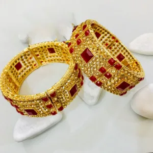 latest Kara Design fashion jewelry for women. The jewelry appears to be intricately designed, featuring delicate patterns and perhaps gemstone embellishments. This Maroon wrist accessory adds a touch of elegance and style to the overall look.