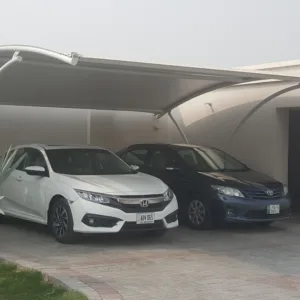 Home car parking shed providing stylish protection for your vehicle, blending seamlessly with your property's aesthetics.