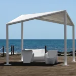 A graceful garden gazebo design with a sail kite roof, exuding timeless elegance. The lovely look of it makes you want to relax in a peaceful place surrounded by nature's hug.